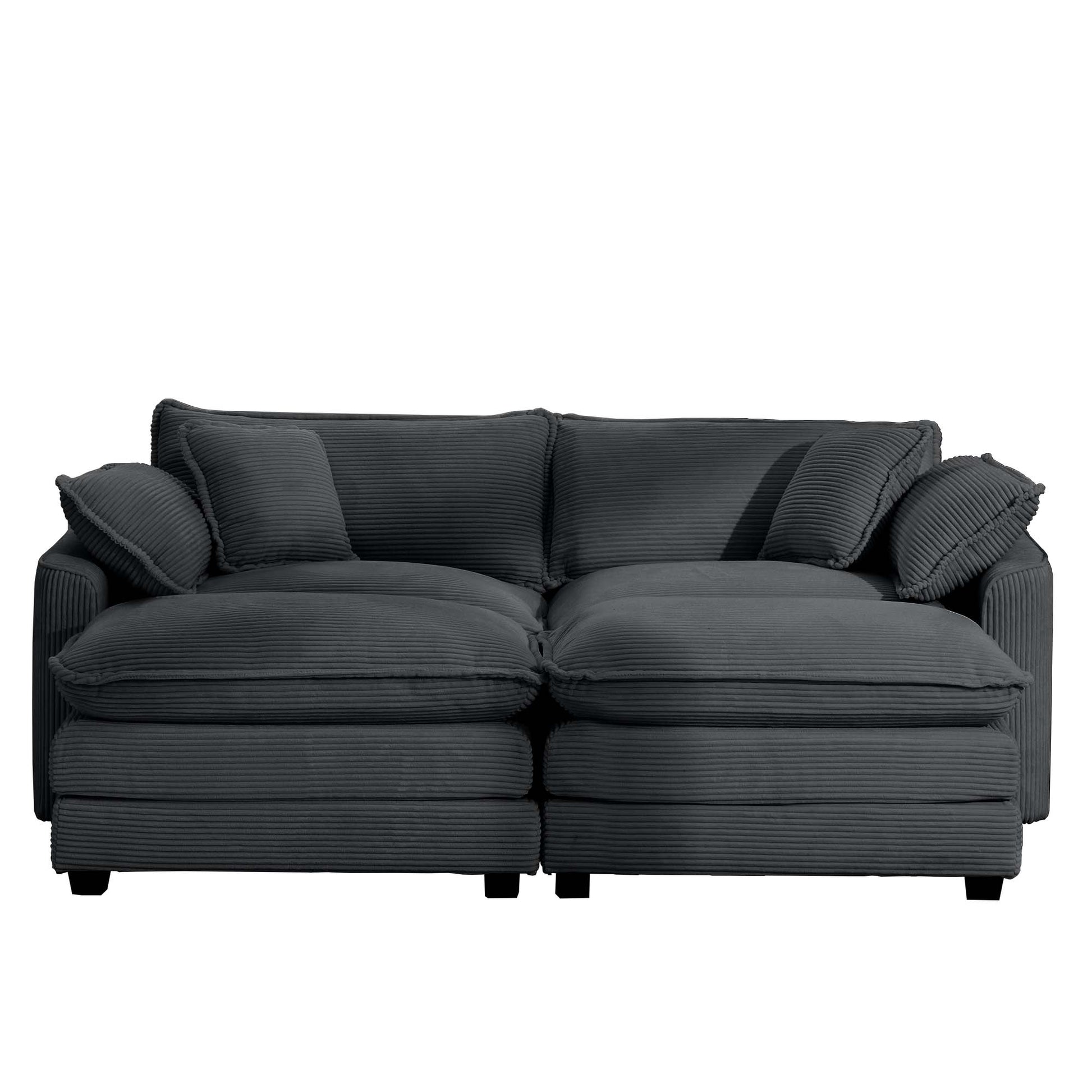 Deep charcoal grey corduroy sofa with plush cushions and removable covers