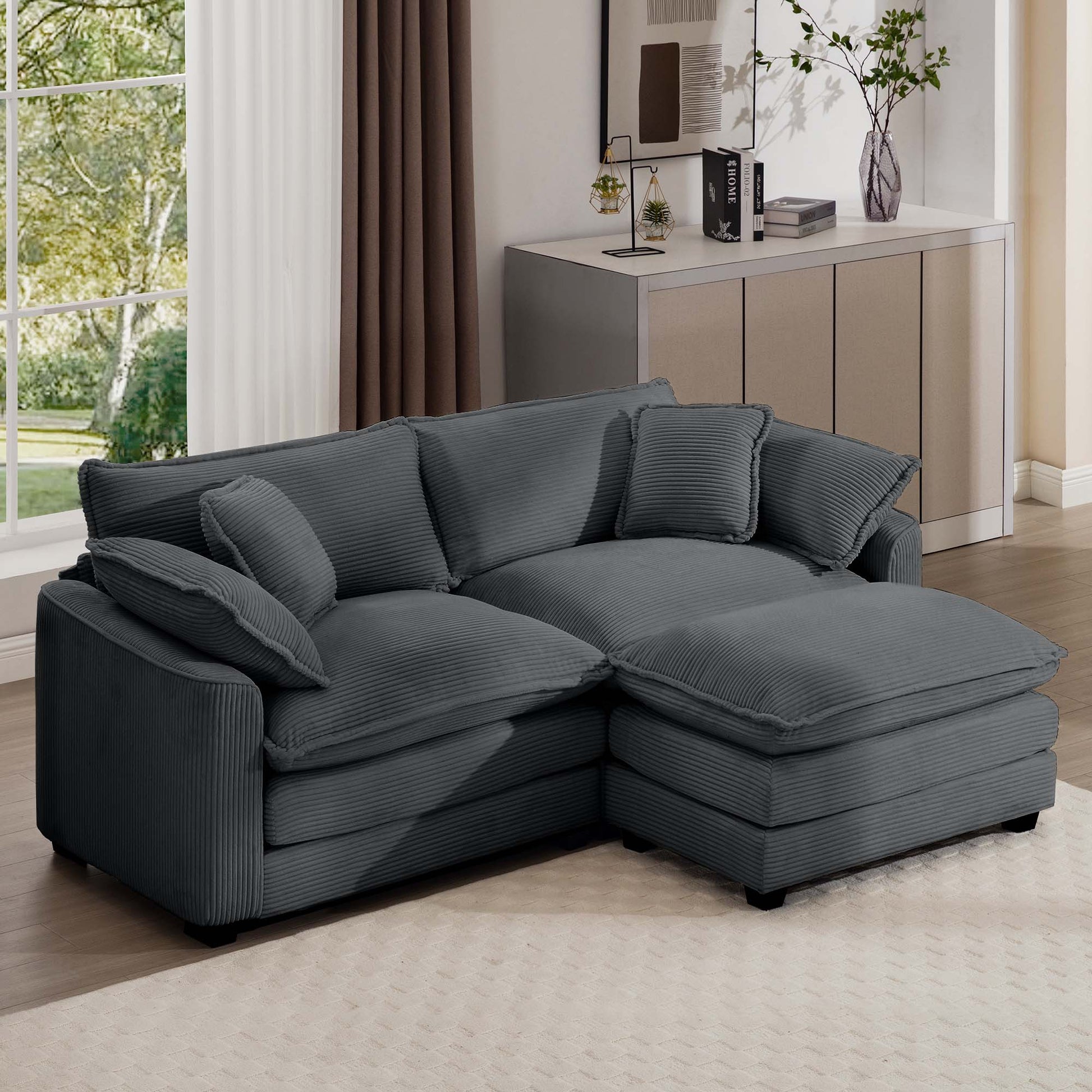 Dark gray corduroy sectional sofa with plush cushions perfect for a modern living room