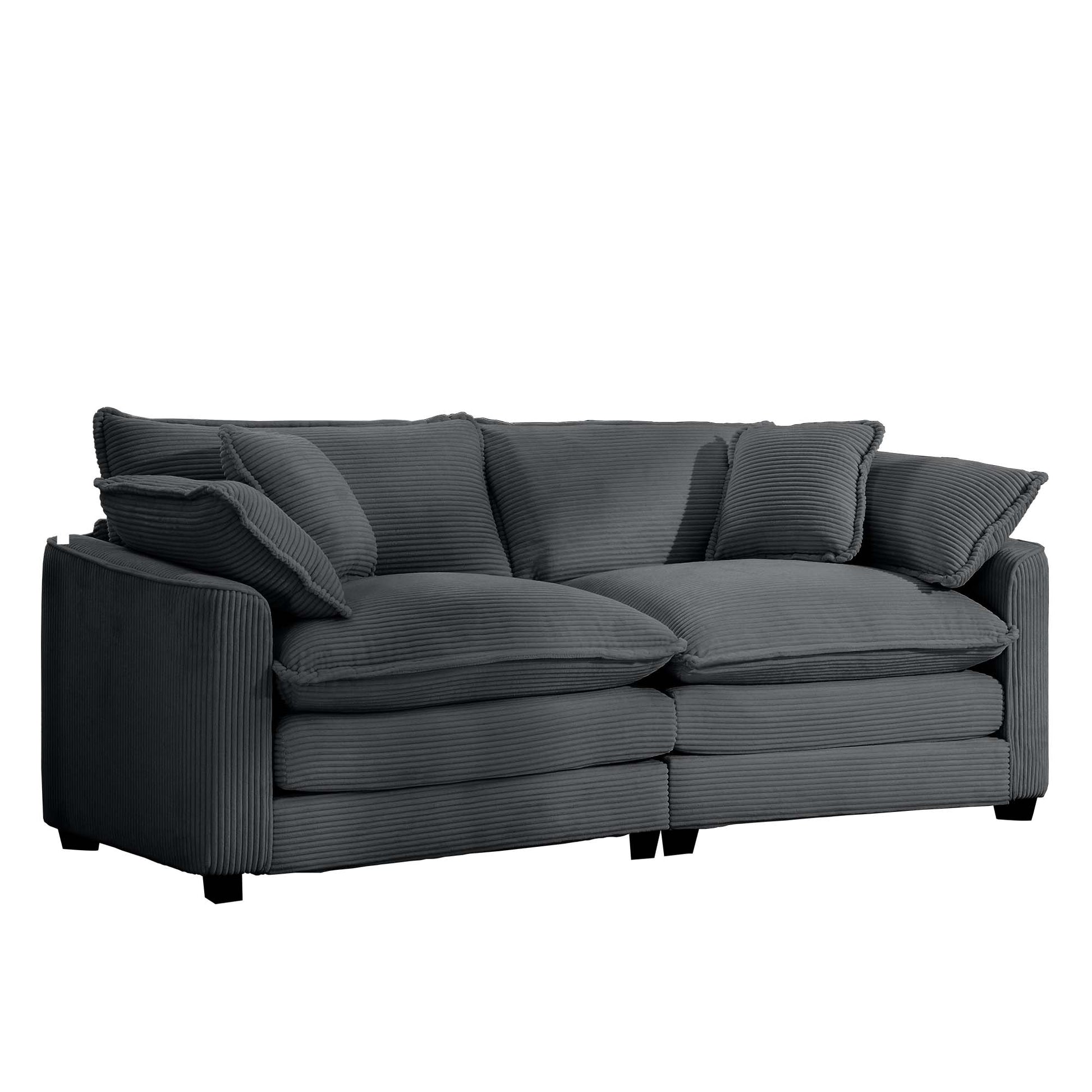 Dark grey corduroy sofa with plush cushions and matching throw pillows offering comfort and modern style
