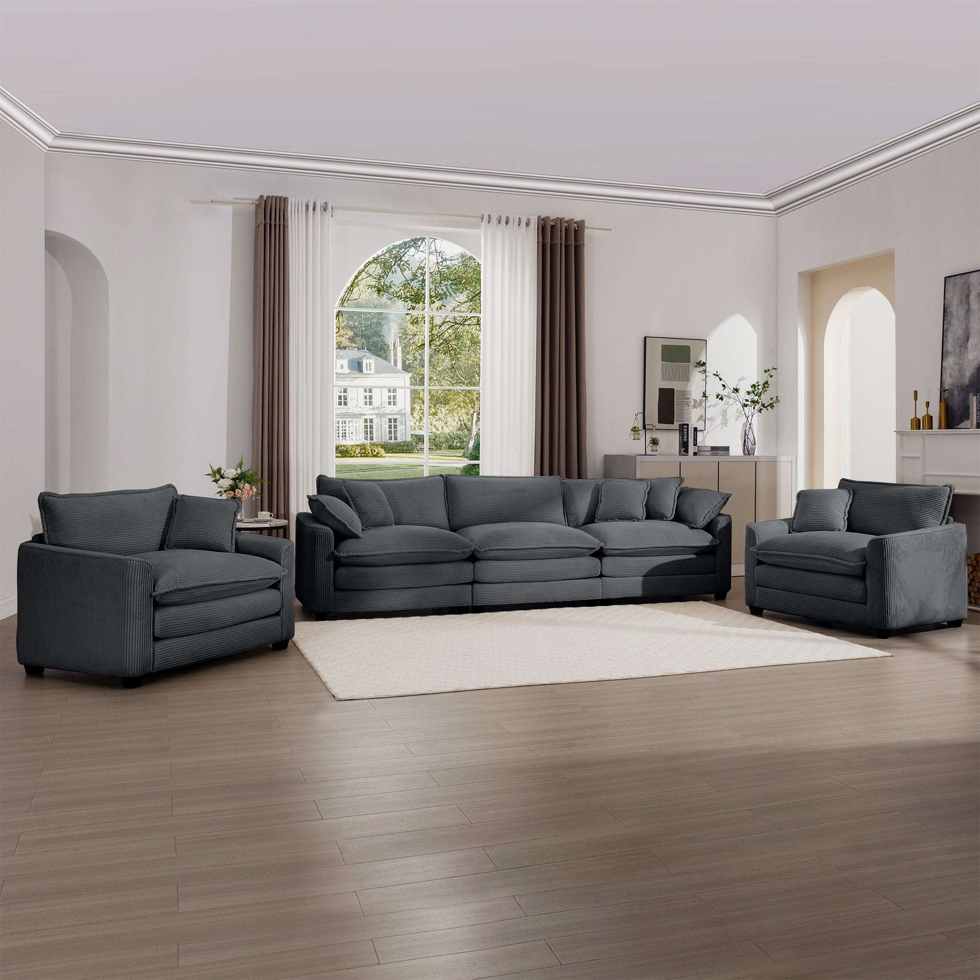 Dark charcoal corduroy sofa set with plush cushions for a modern living room