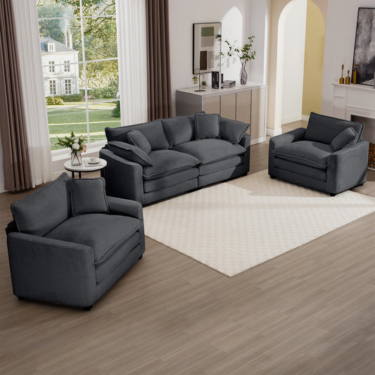 Plush dark gray corduroy sofa with multiple cushions for ultimate comfort