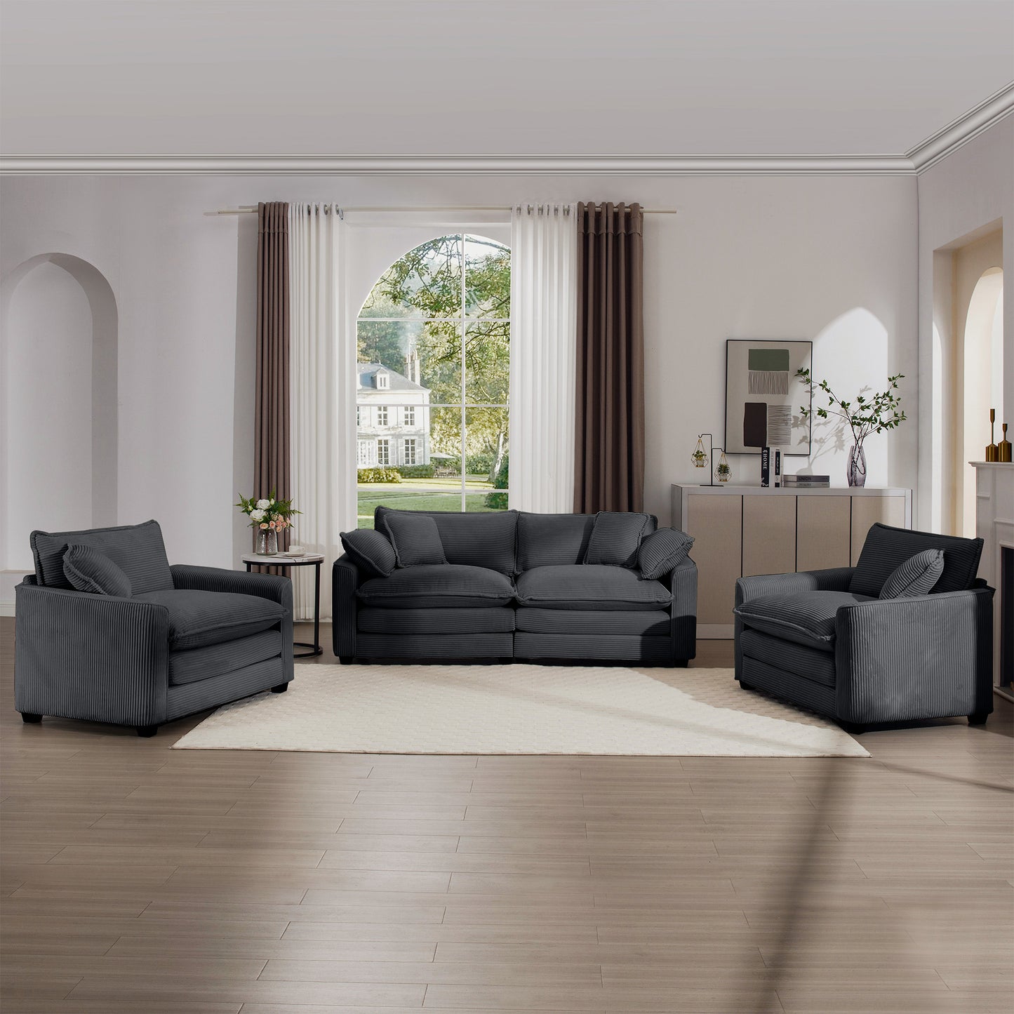 Charcoal grey corduroy sofa with plush cushions perfect for a modern living room setup