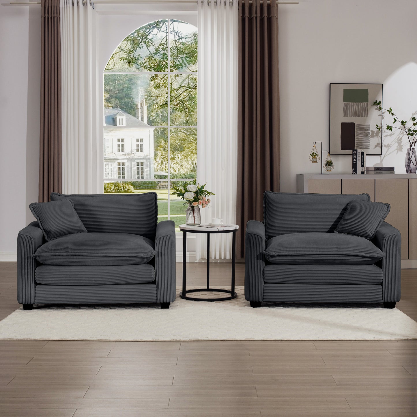 Plush dark gray corduroy armchair with deep cushions perfect for cozy living rooms