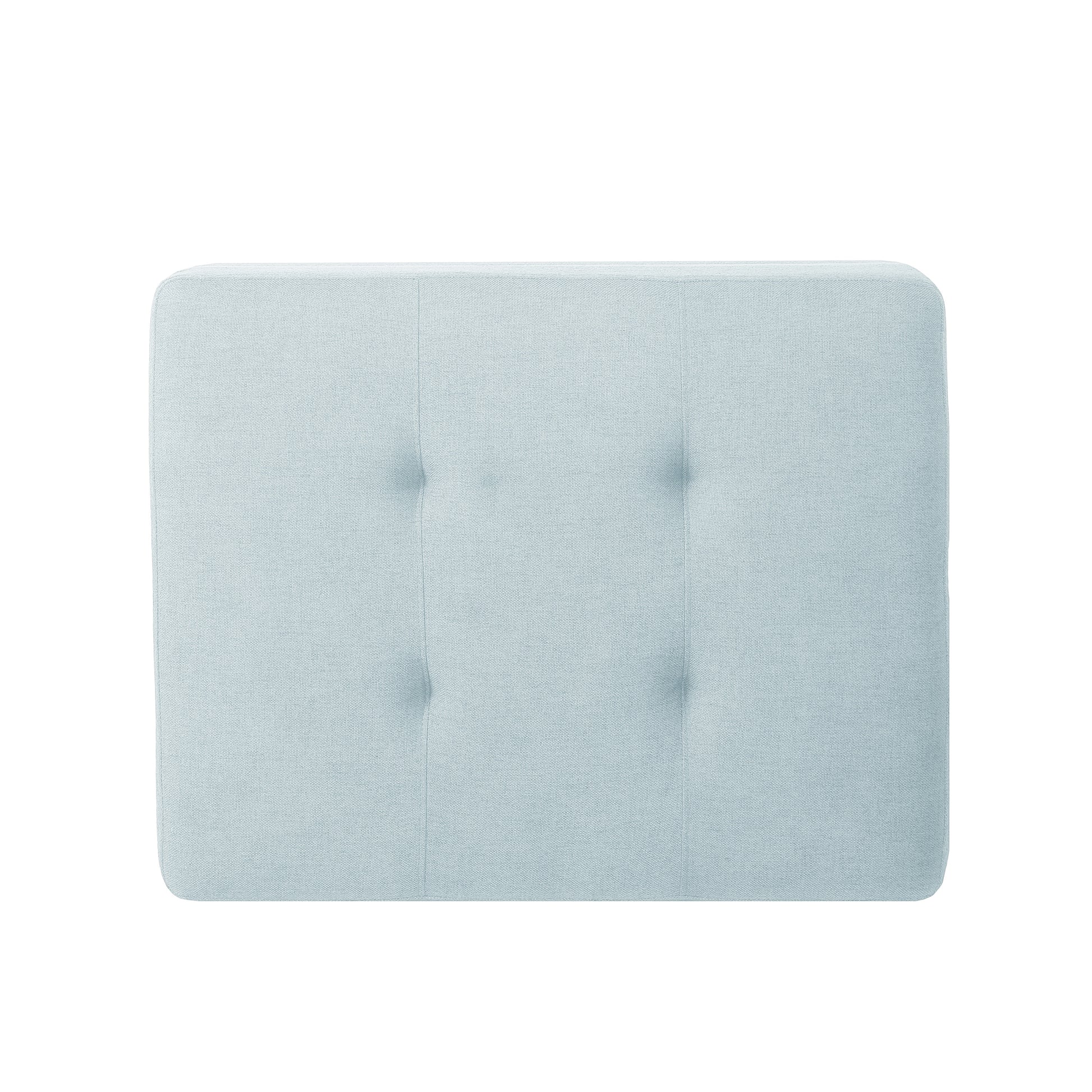 Light blue fabric ottoman with subtle tufting for modern living rooms