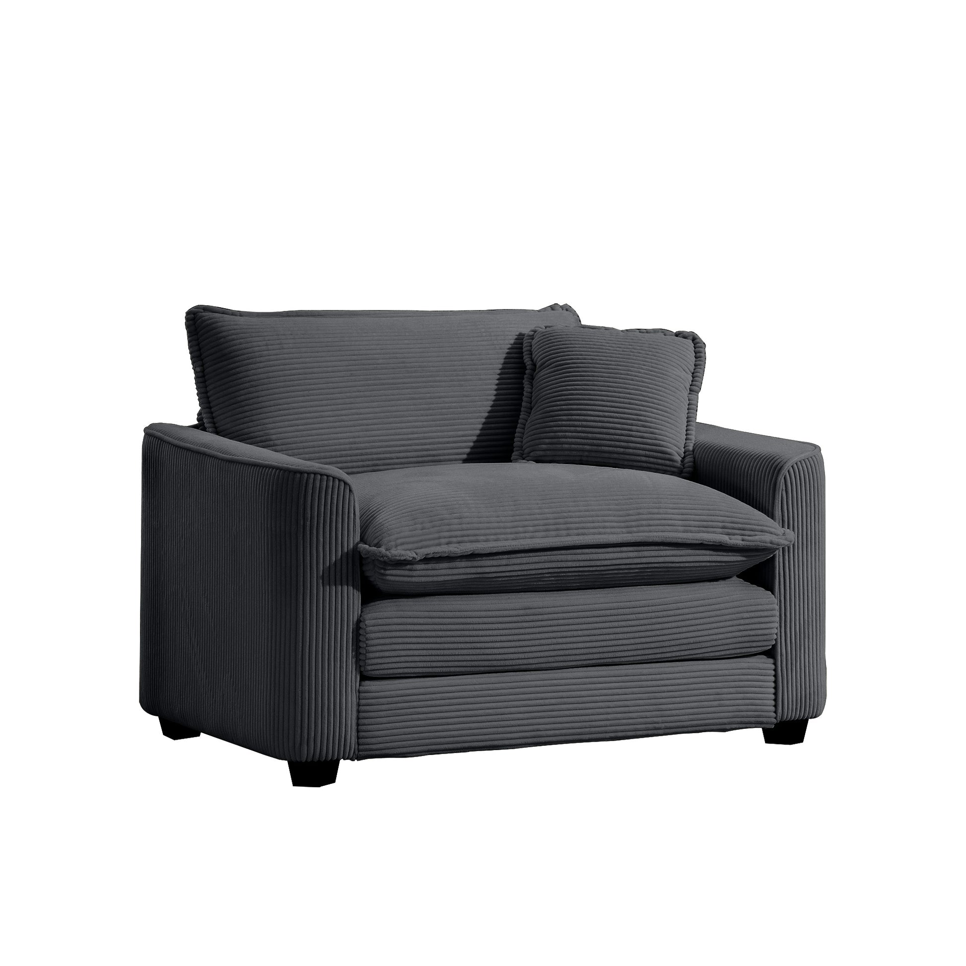 Cozy dark grey corduroy armchair with plush cushions and matching throw pillow