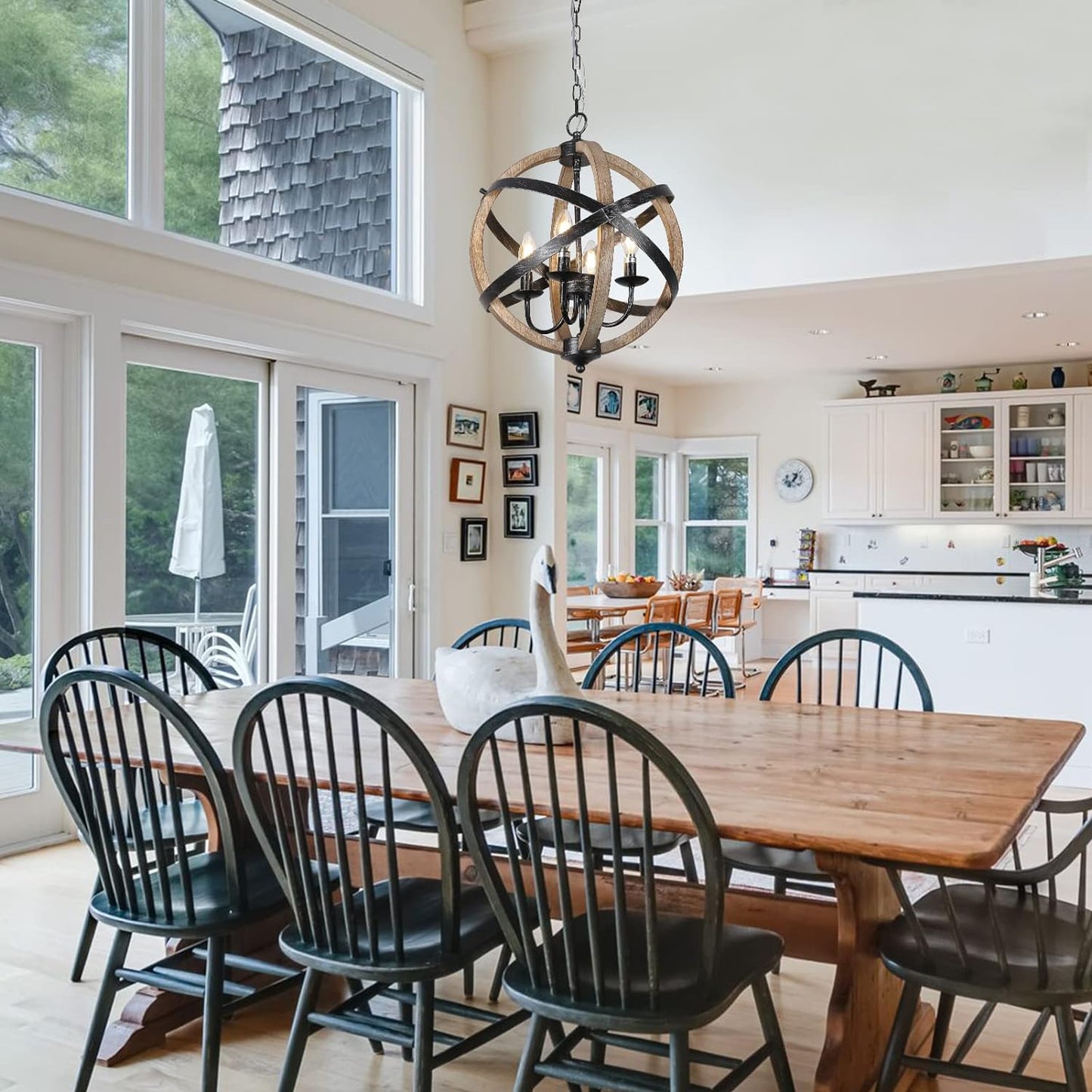 Rustic orb chandelier with wood and black metal accents perfect for dining rooms