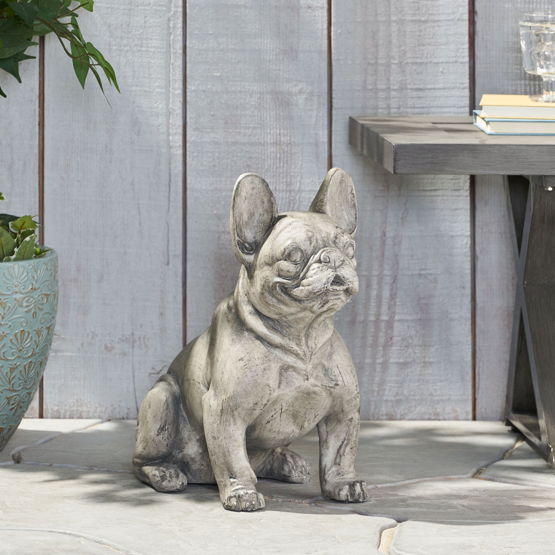 Weathered grey concrete French Bulldog statue ideal for garden or patio decor
