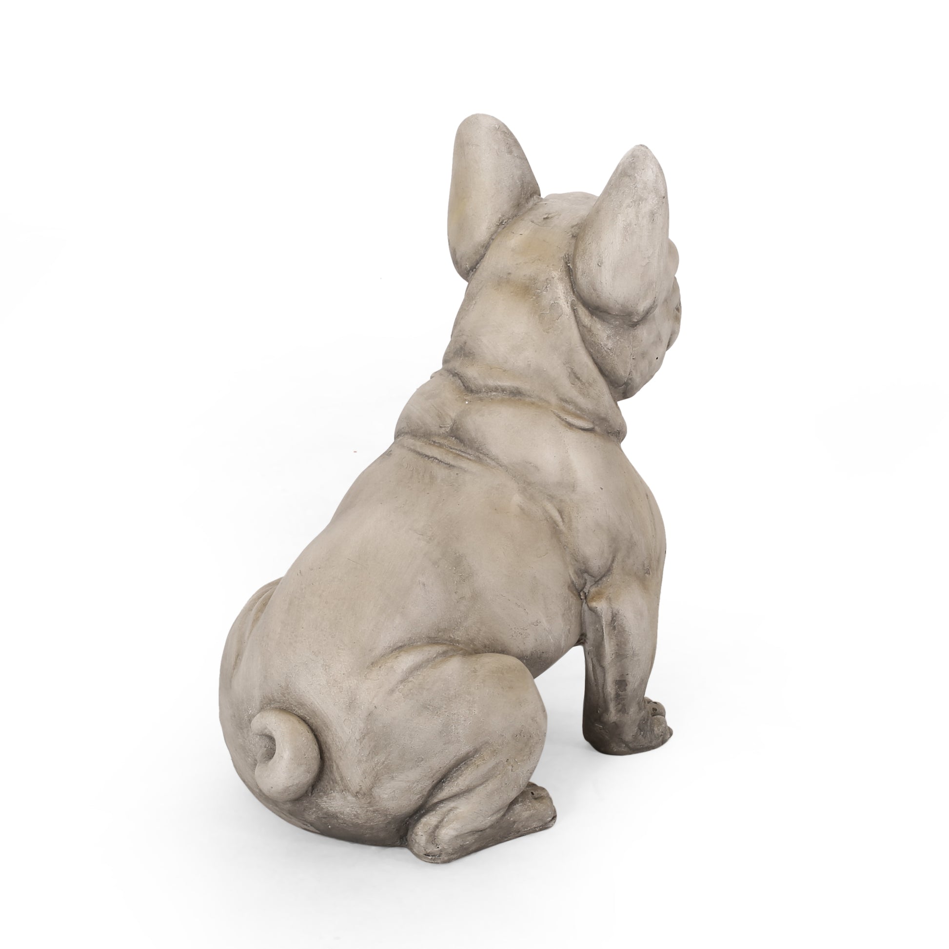 Weathered concrete French bulldog garden statue sitting pose with curled tail