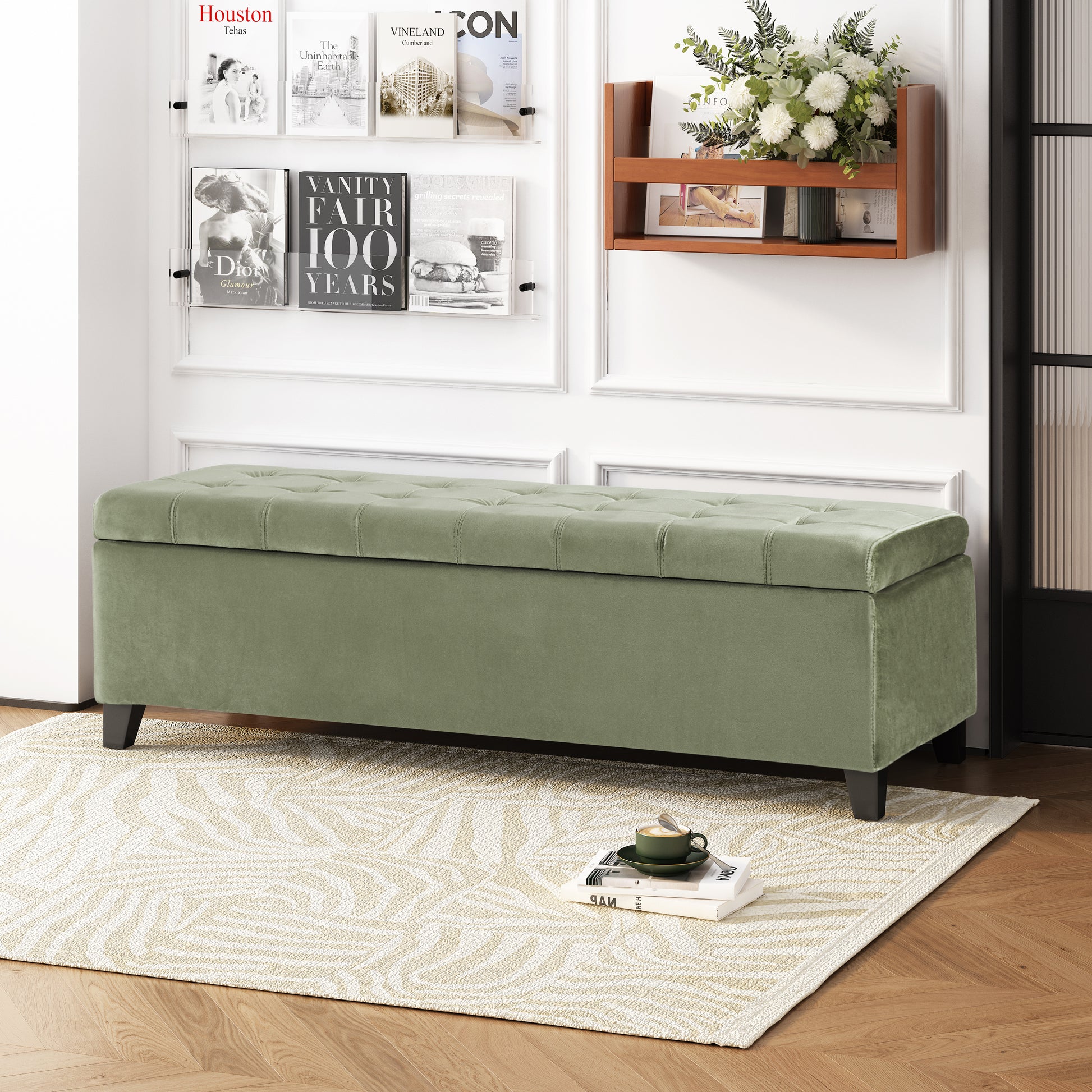 Sage green velvet storage bench with tufted top and dark wood legs
