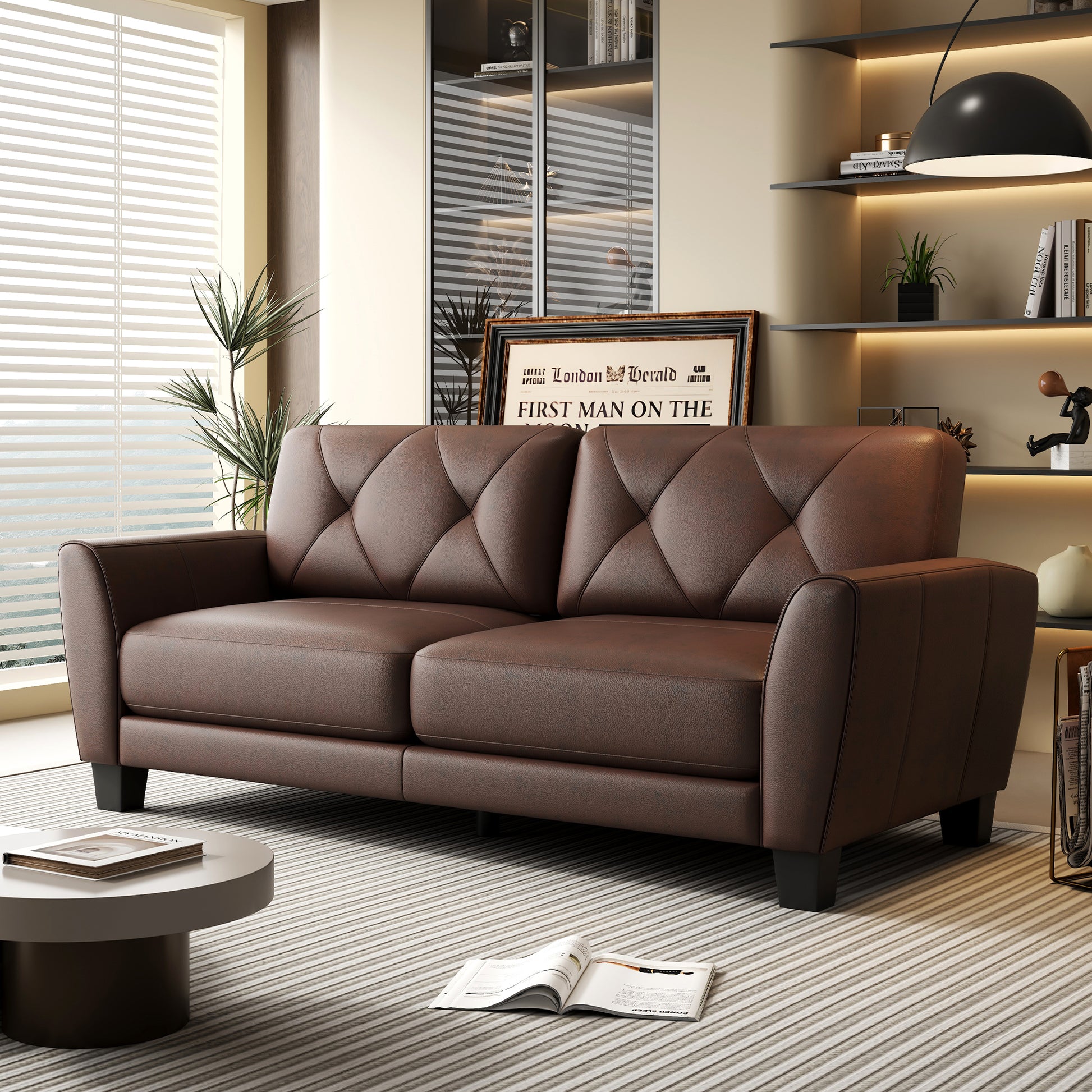 Tufted dark brown leather sofa with diamond stitching and clean lines