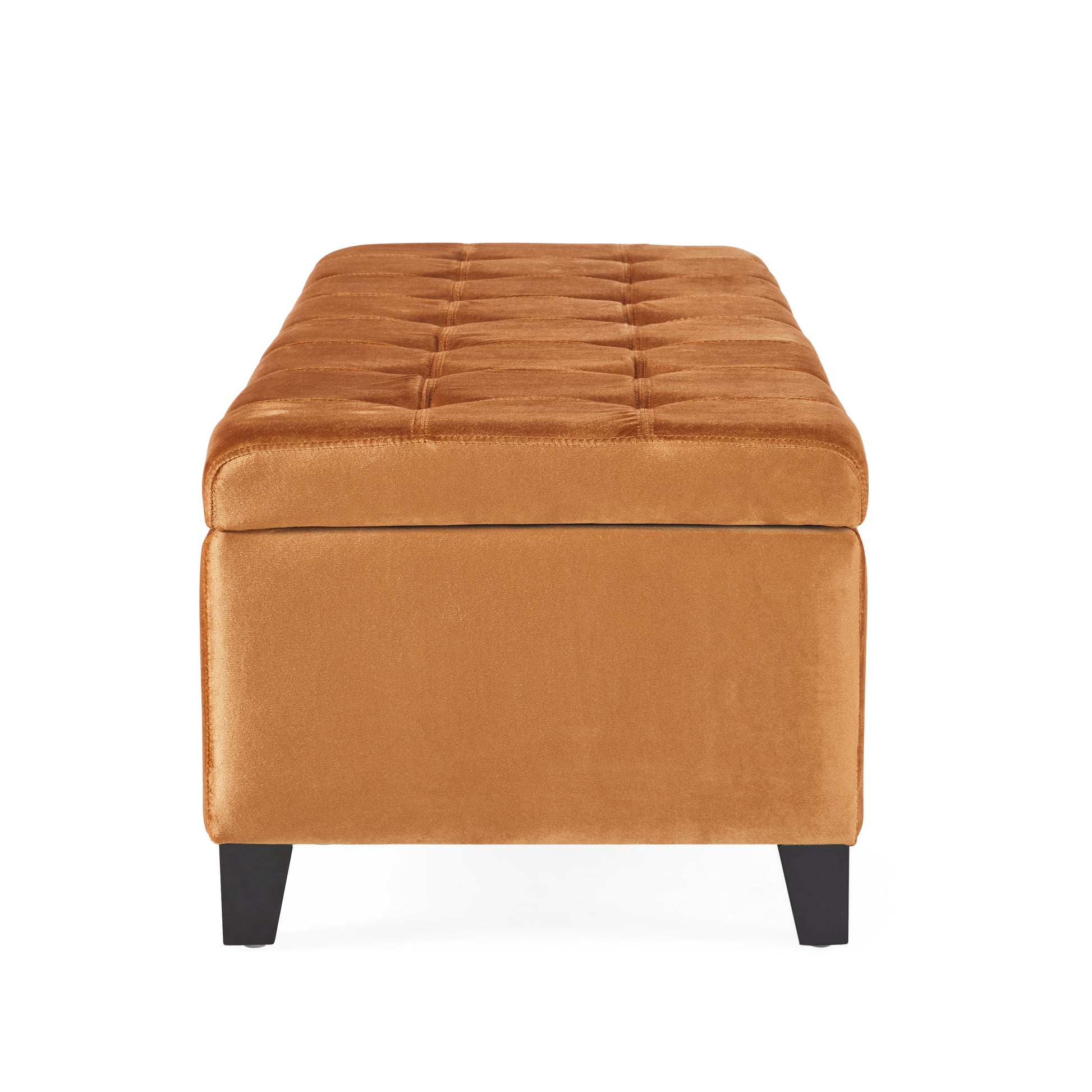 Tufted orange velvet storage ottoman with dark legs ideal for living rooms