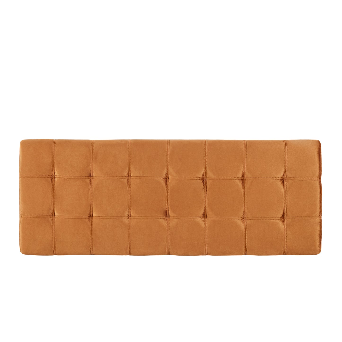 Tufted amber velvet ottoman with channel stitching offering a plush accent seat