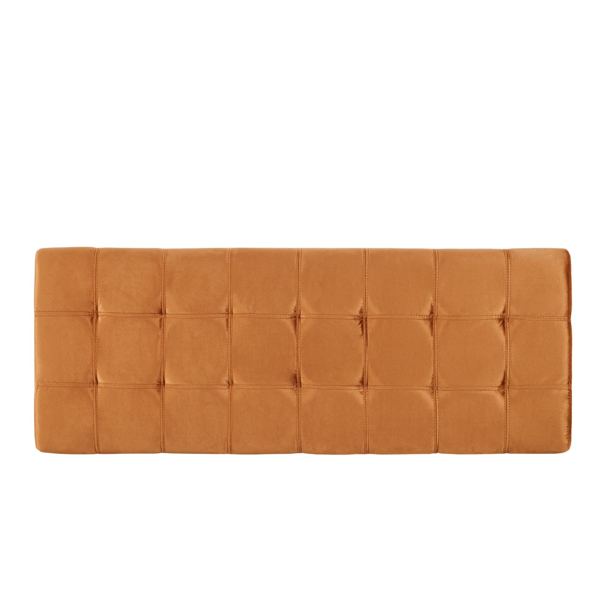 Tufted amber velvet ottoman with channel stitching offering a plush accent seat
