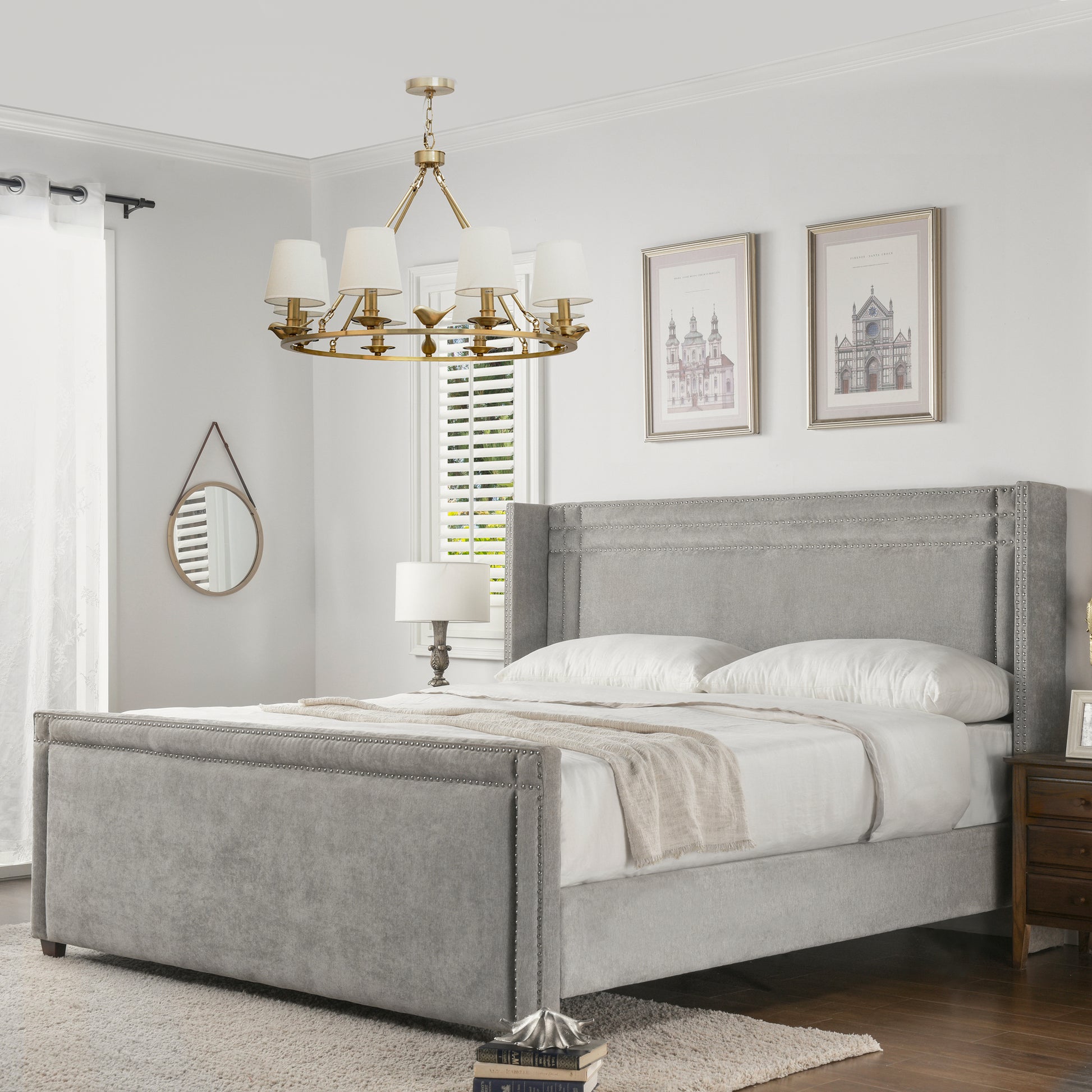 Elegant grey velvet king bed with silver nailhead trim