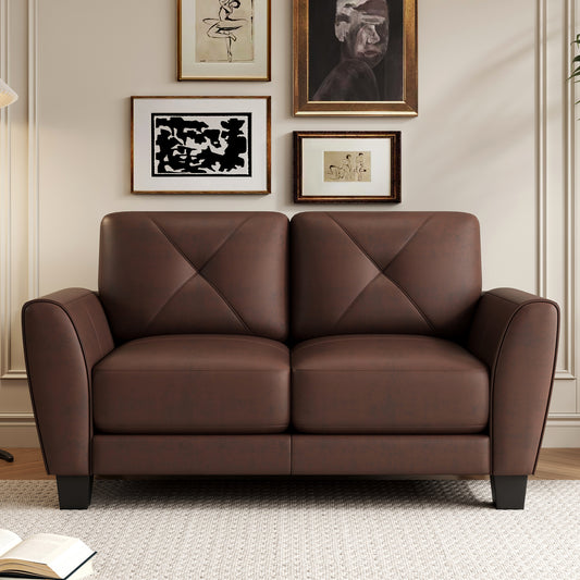 Brown leather loveseat with tufted back and rolled arms