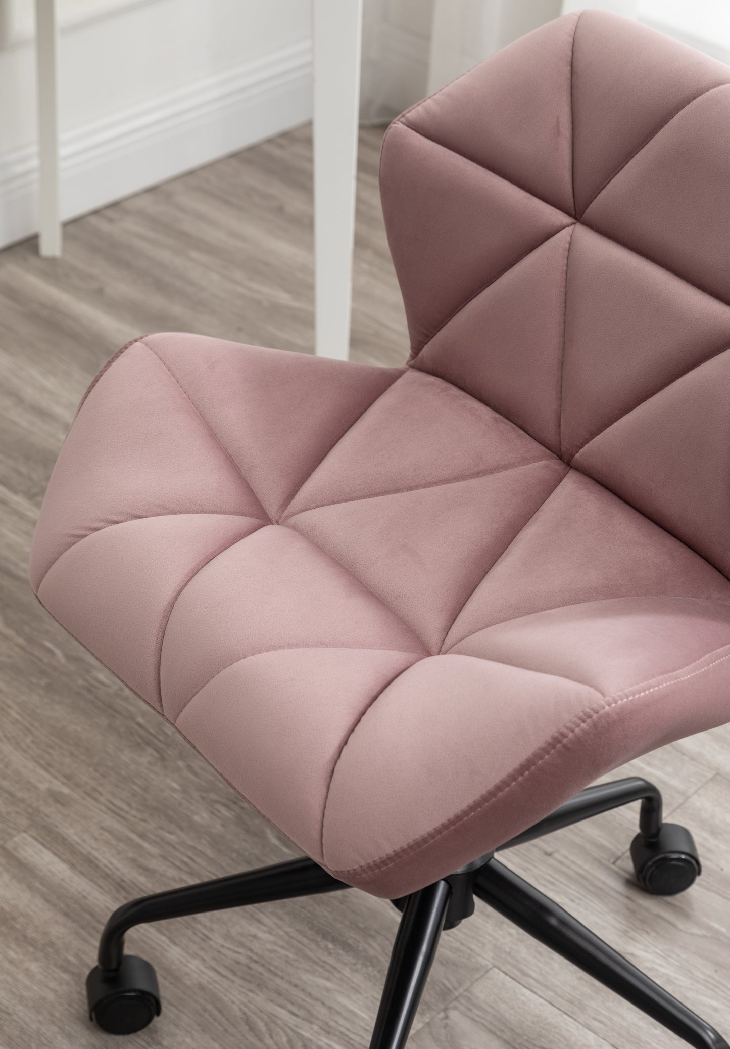 Dusty rose velvet desk chair with diamond tufting detail
