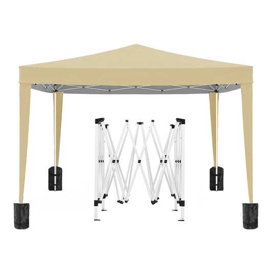 Tan x popup canopy tent with a folded white frame and black weight bags