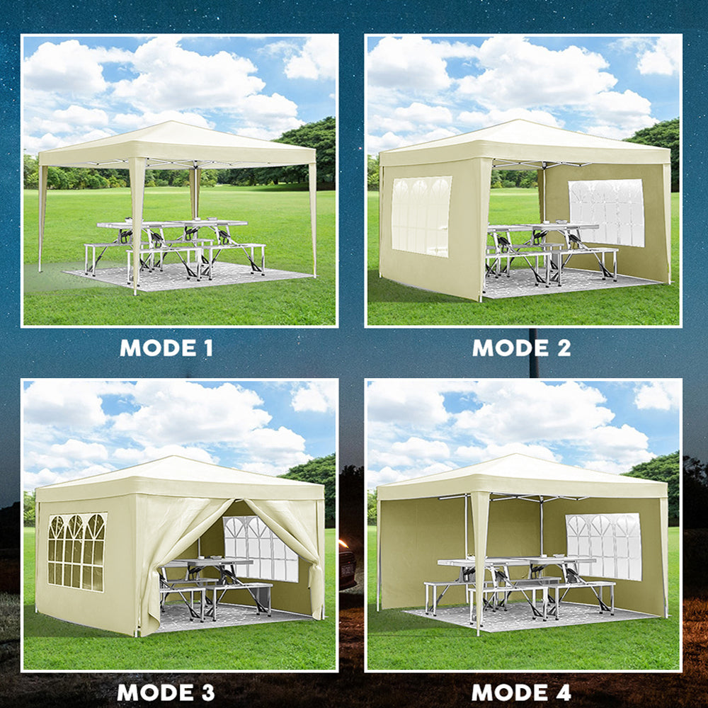 Mode  Open canopy tent with picnic tables and benches on green grass