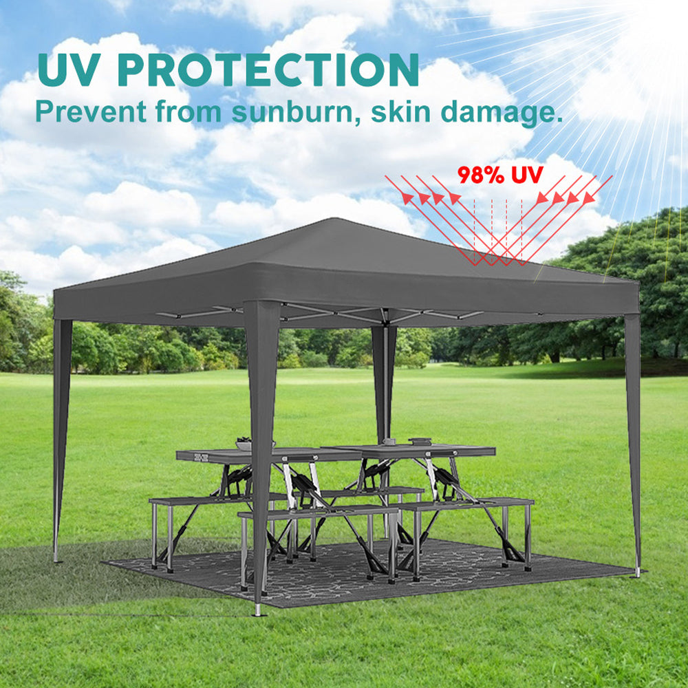 Dark grey popup canopy tent with picnic tables and benches offering UV protection