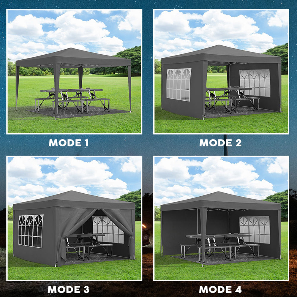 Dark gray popup canopy tent set up with picnic tables and benches for outdoor use