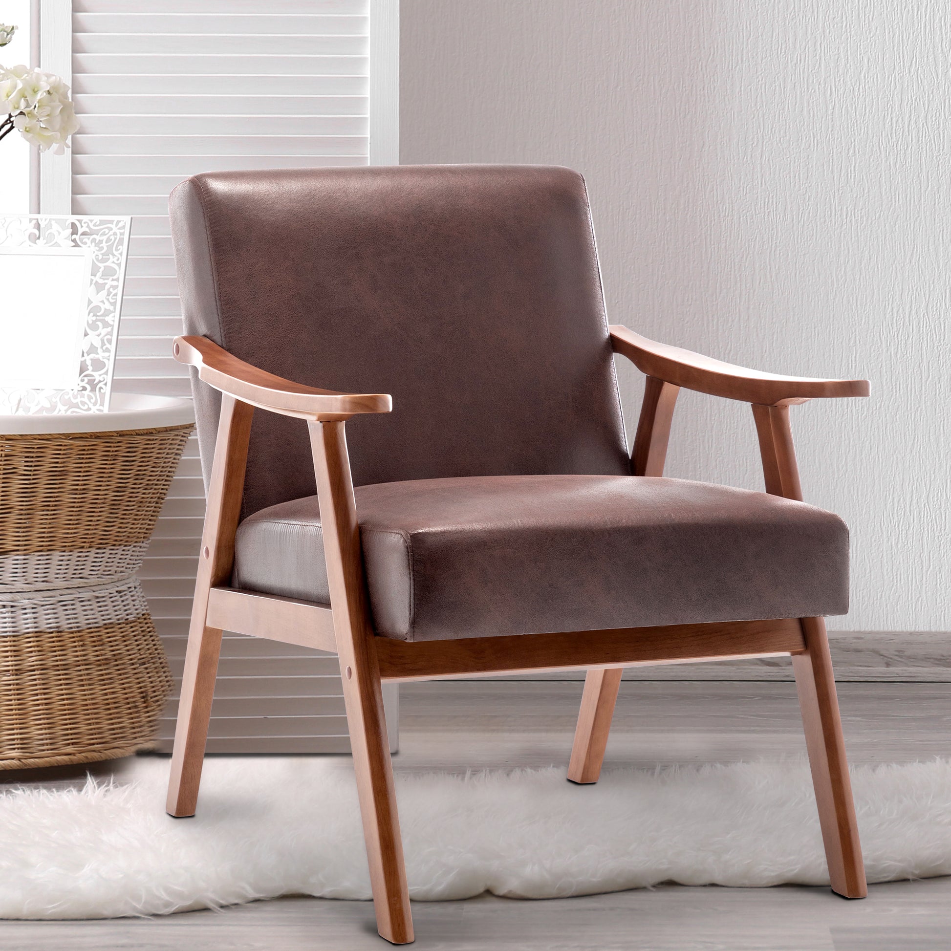 Brown faux leather armchair with natural wood frame and arms