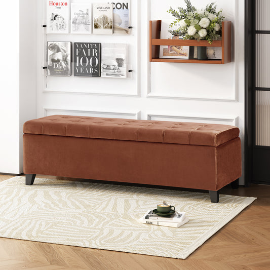 Tufted brown velvet storage ottoman with button accents and dark wood legs