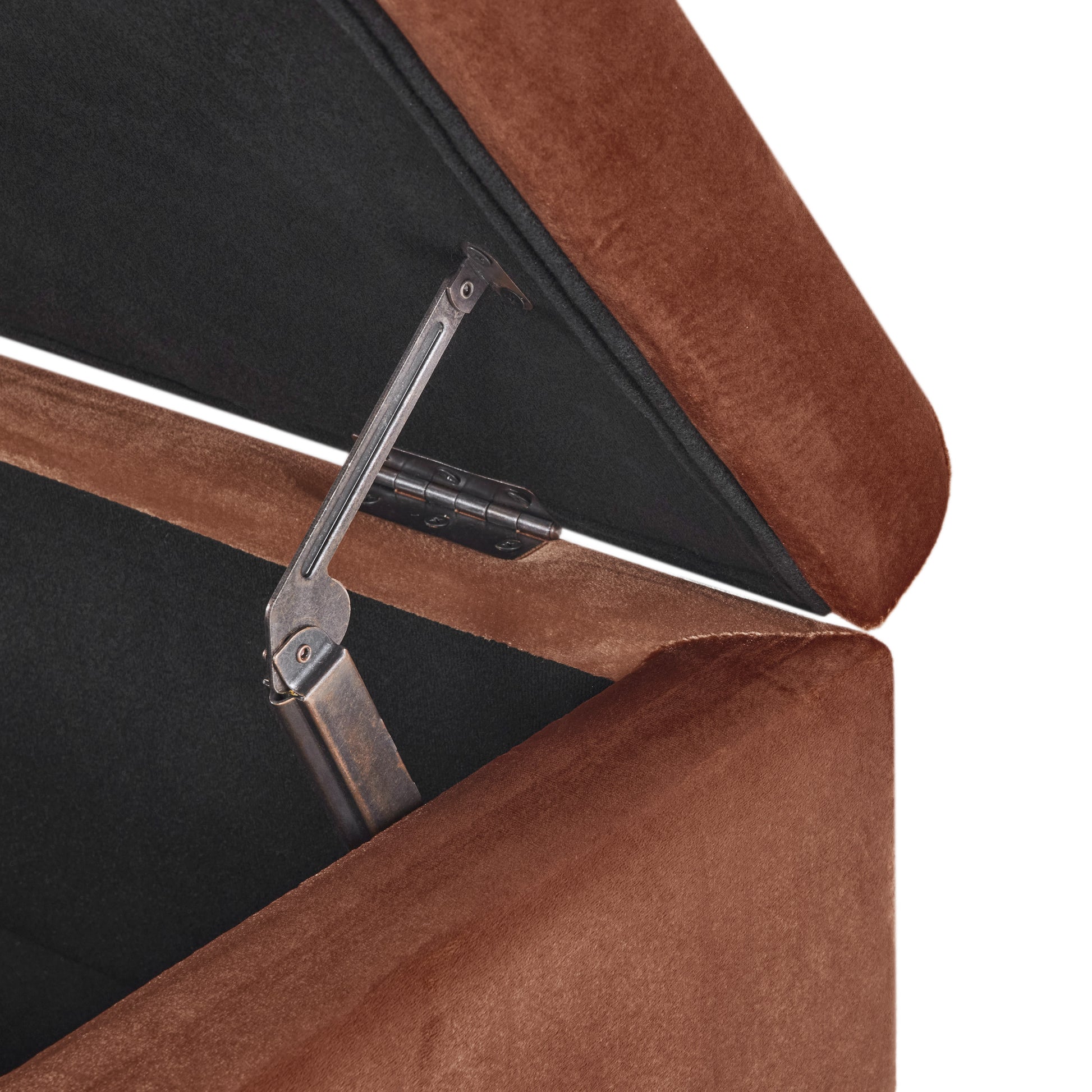 Brown velvet storage ottoman with open lid and metal hinge detail