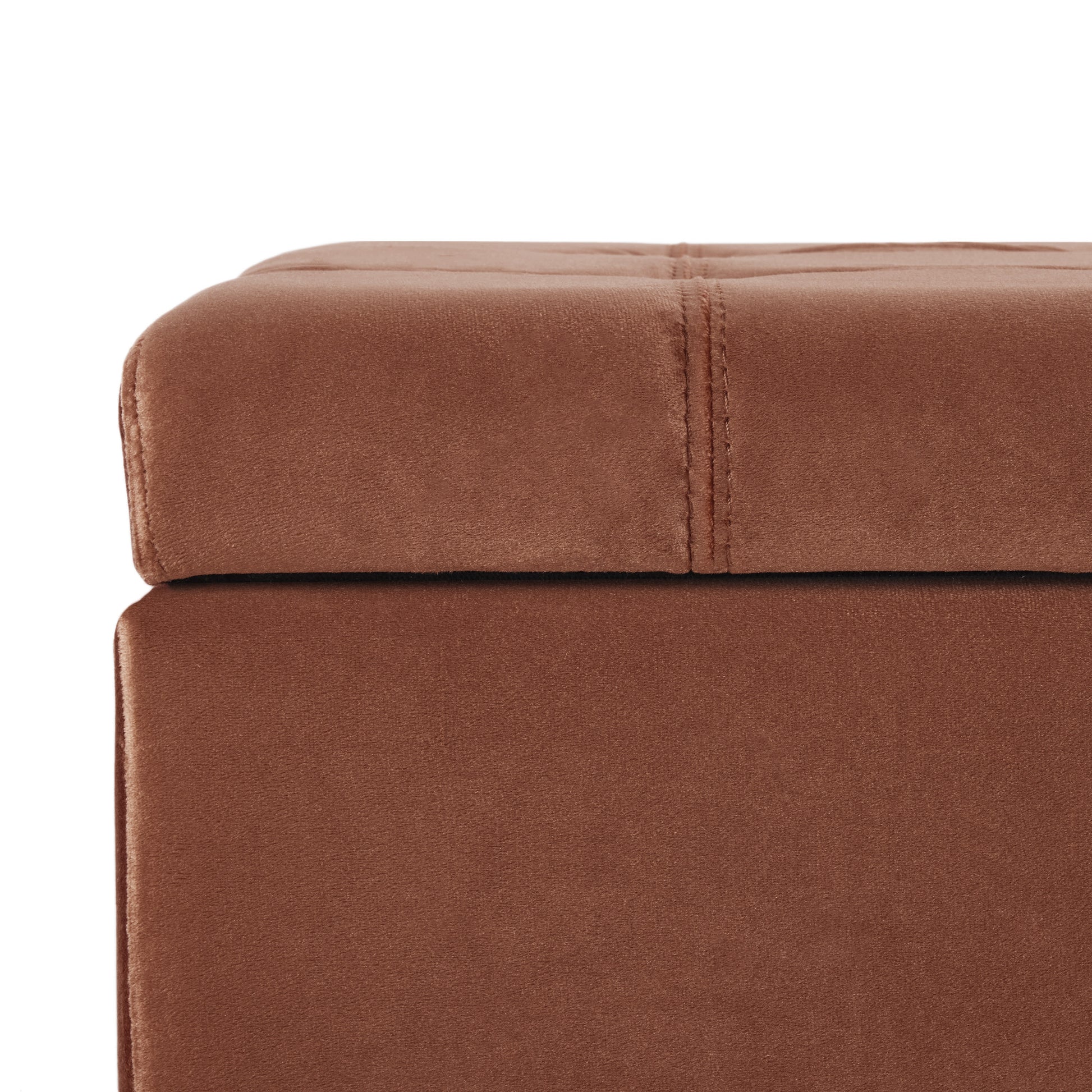 Plush brown velvet ottoman with tufted top and clean lines for modern decor