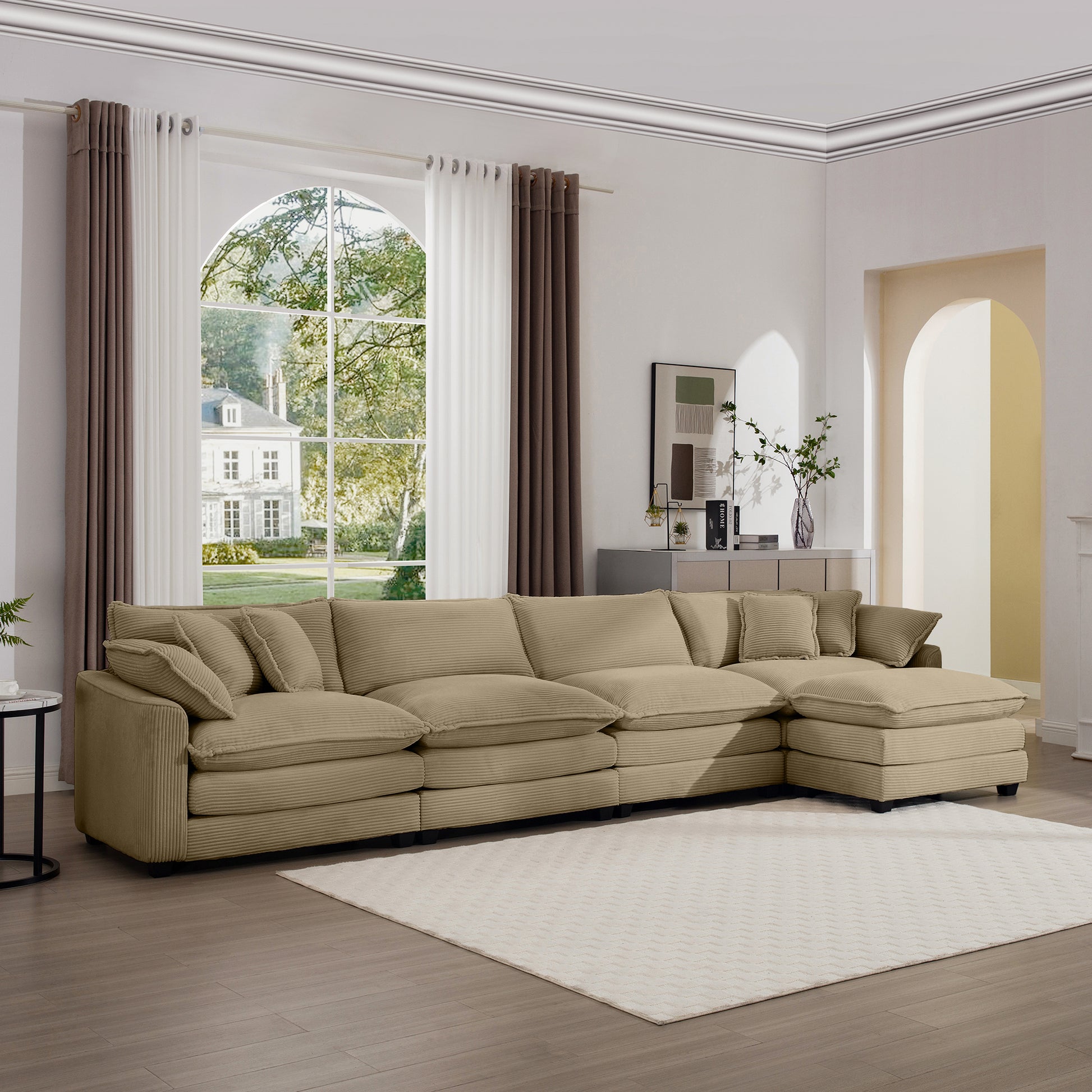 Beige corduroy sectional sofa with plush cushions and chaise