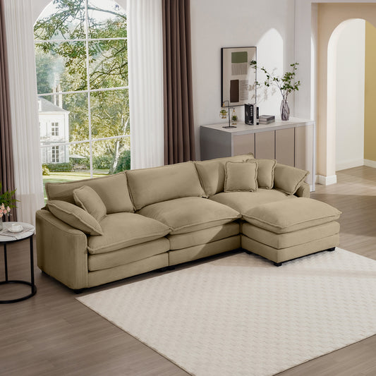 Beige corduroy sectional sofa with plush cushions and chaise lounge
