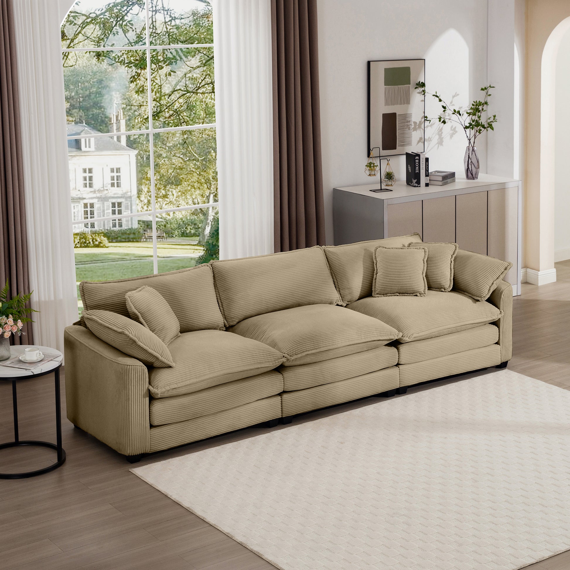 Beige corduroy sectional sofa with plush cushions perfect for a modern living room