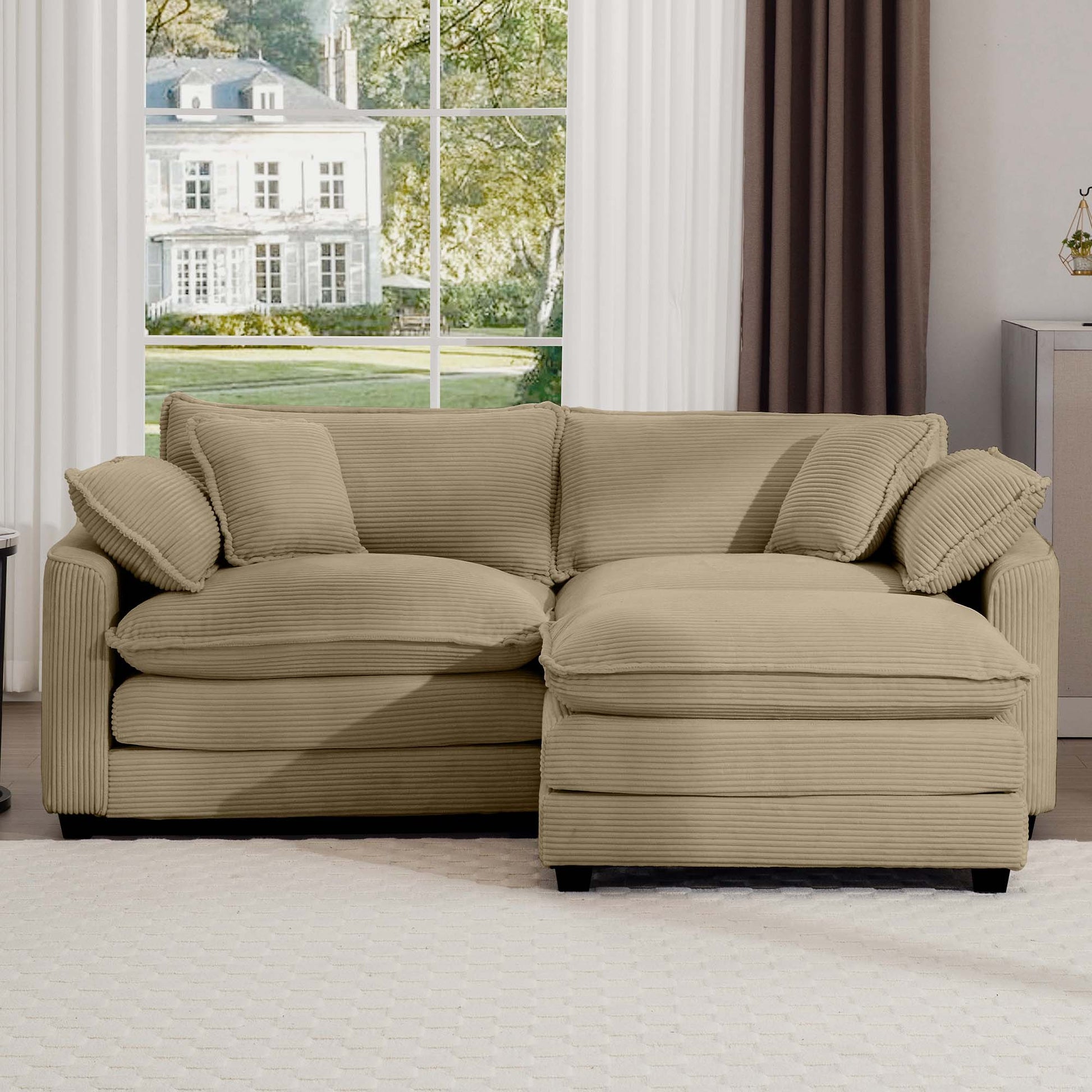 Beige corduroy sectional sofa with plush cushions and matching throw pillows