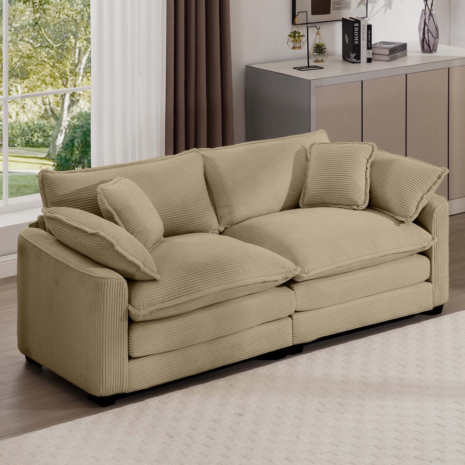 Plush beige corduroy sectional sofa with ample seating and throw pillows perfect for a cozy living room