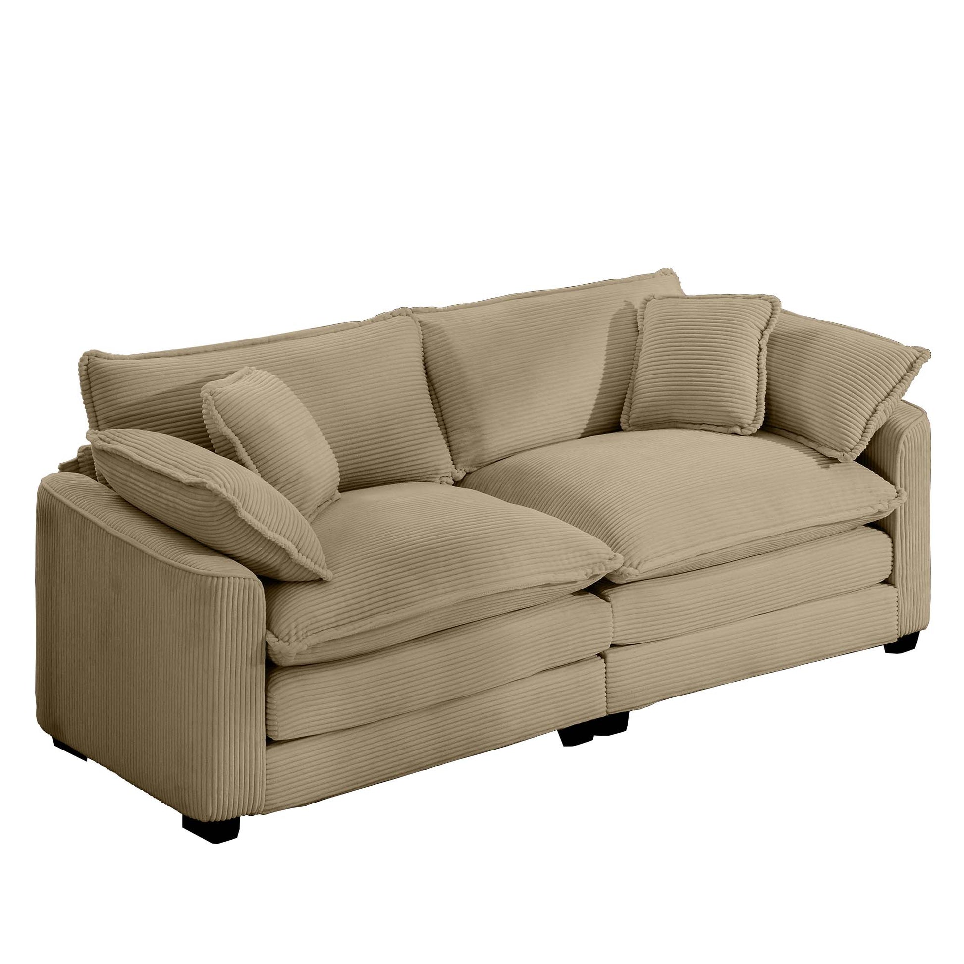 Plush beige corduroy sofa with deep comfortable seating and multiple throw pillows