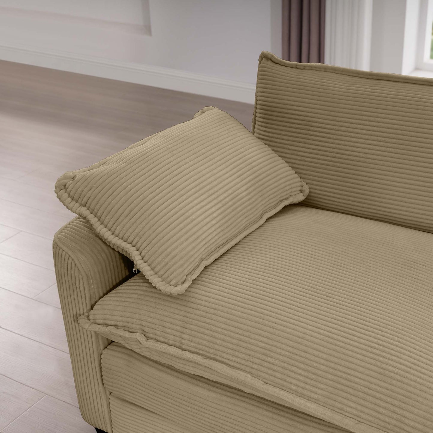 Beige corduroy sofa with plush throw pillow perfect for cozy living rooms