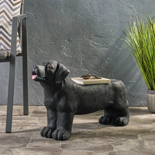 Black Labrador dog statue side table with realistic fur texture and book detail