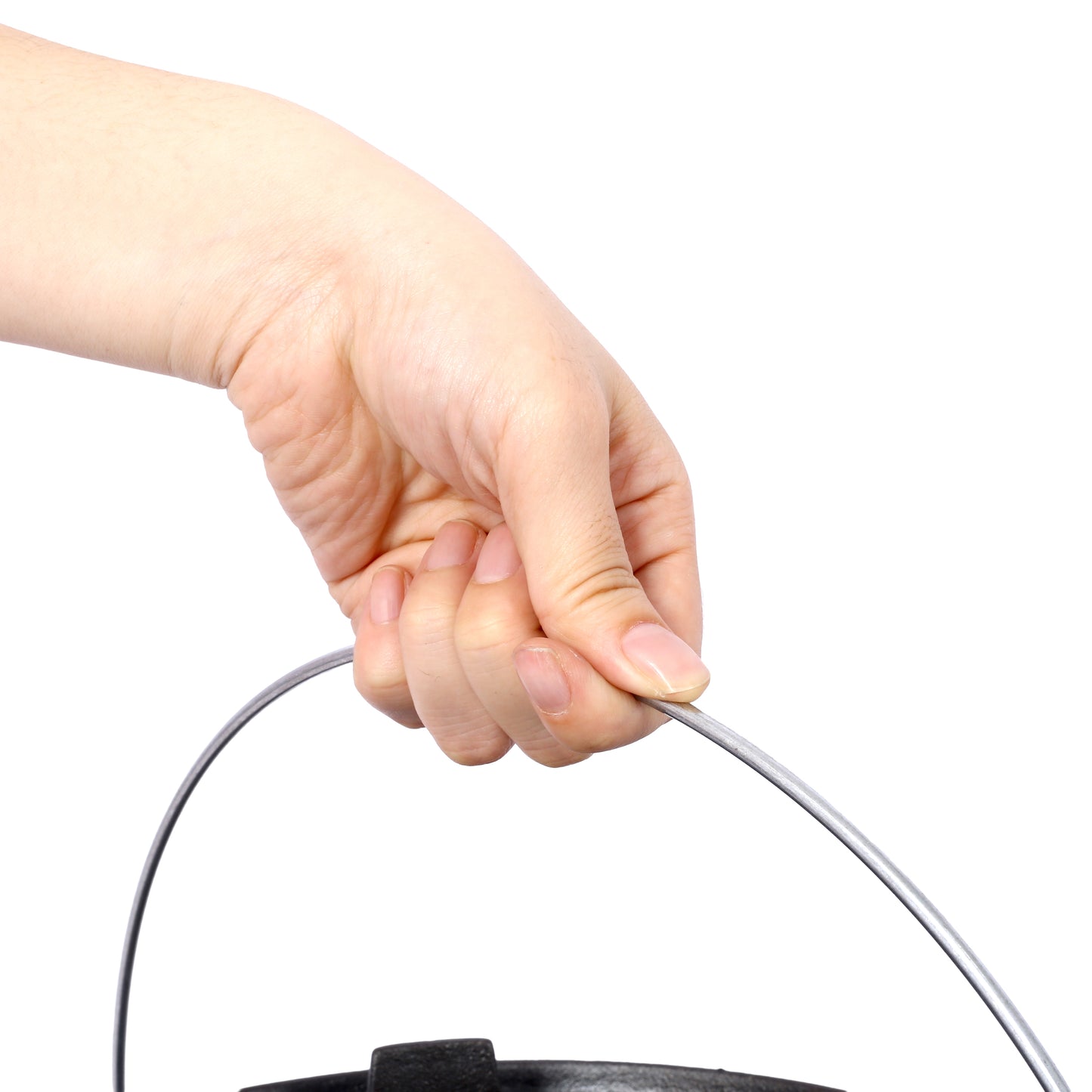 Closeup of hand holding a silver metal bucket handle perfect for outdoor use