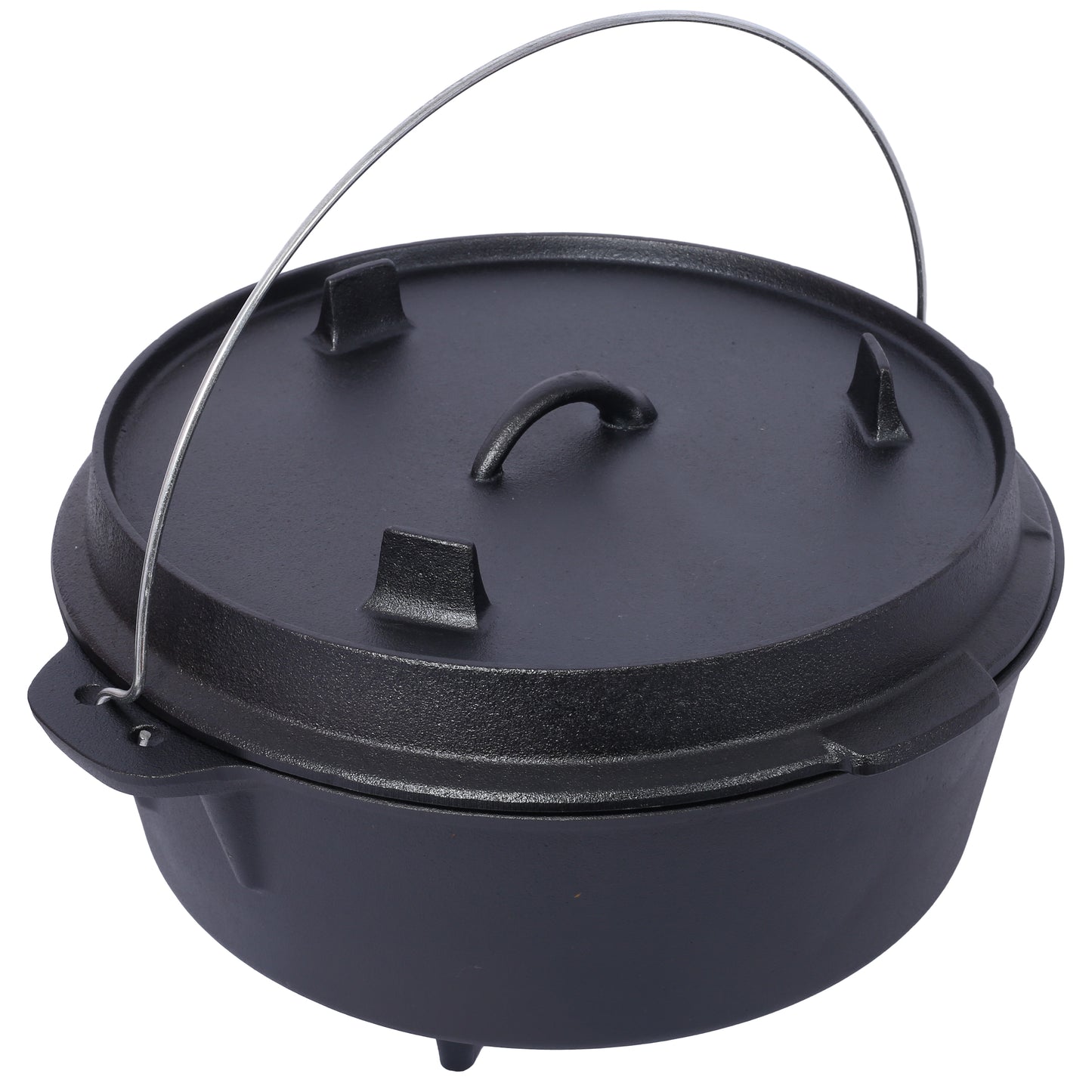 Black cast iron dutch oven with lid and wire handle for campfire cooking