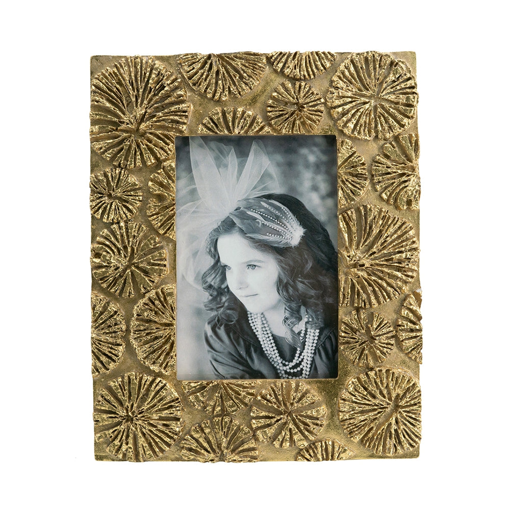 Ornate gold textured picture frame with raised floral motif