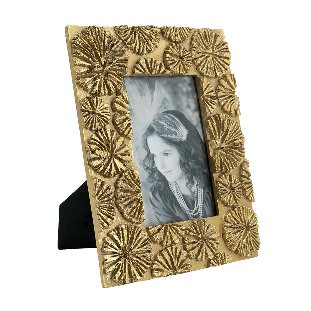 Textured gold ornate picture frame with raised floral designs