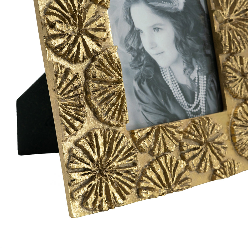 Textured gold photo frame with embossed floral design perfect for displaying treasured memories