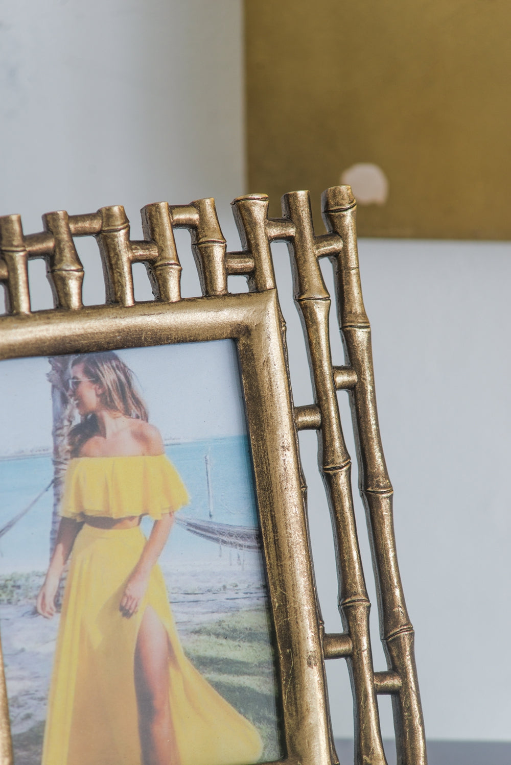 Antique gold bamboostyle picture frame with intricate detail for elegant home decor