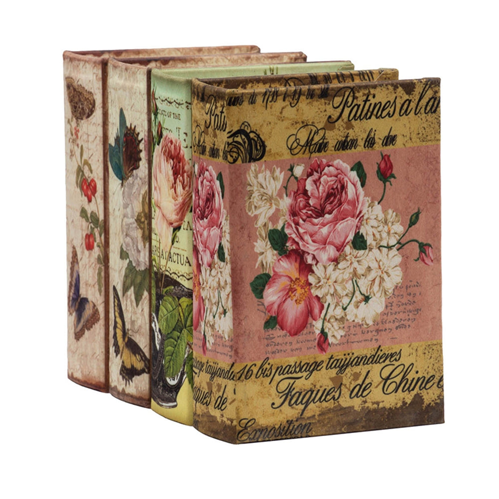 Vintage style decorative bookends with floral and butterfly designs