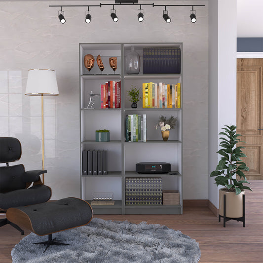 Black leather lounge chair with wooden accents and matching ottoman on fluffy rug