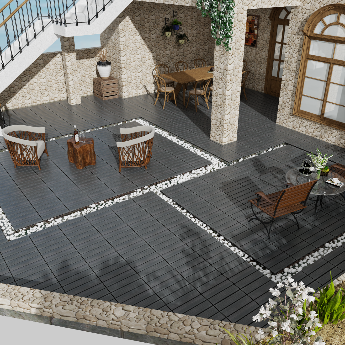 Dark grey composite decking tiles with white pebble accents for an outdoor patio