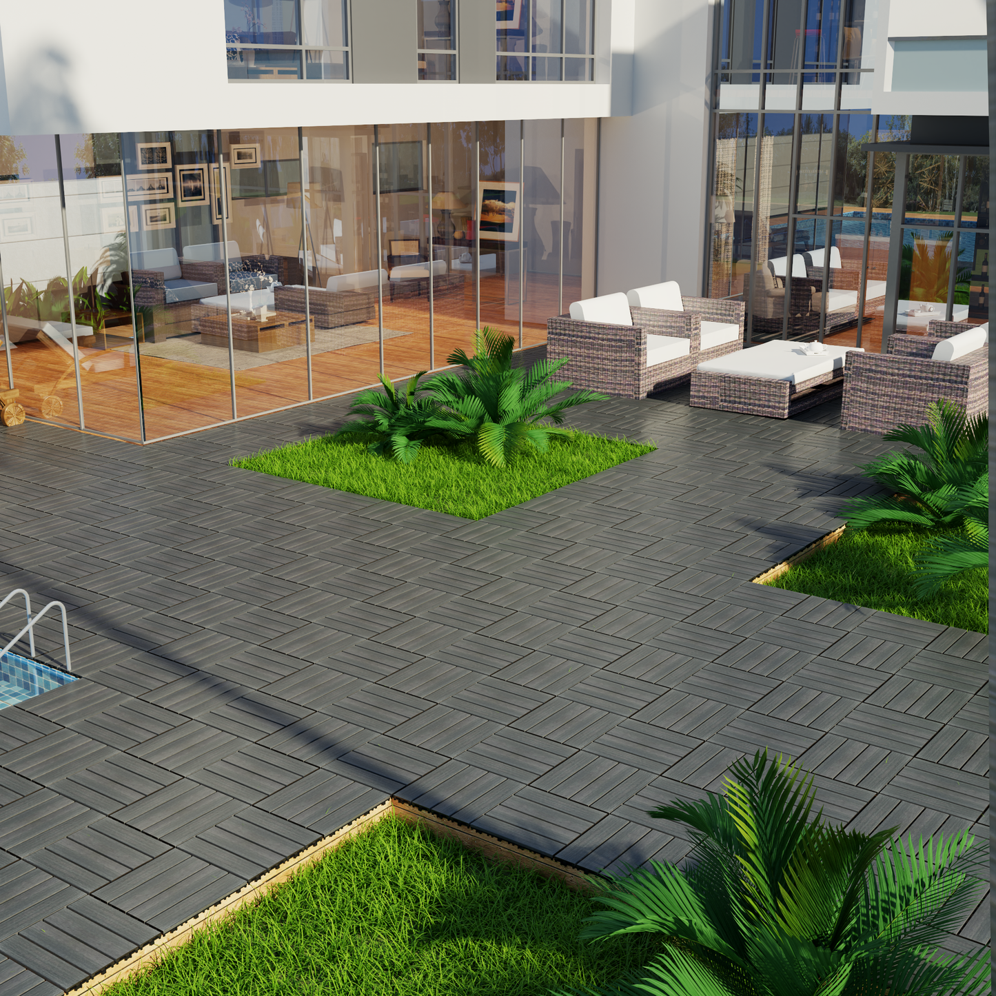 Dark grey interlocking deck tiles arranged in a herringbone pattern on a patio