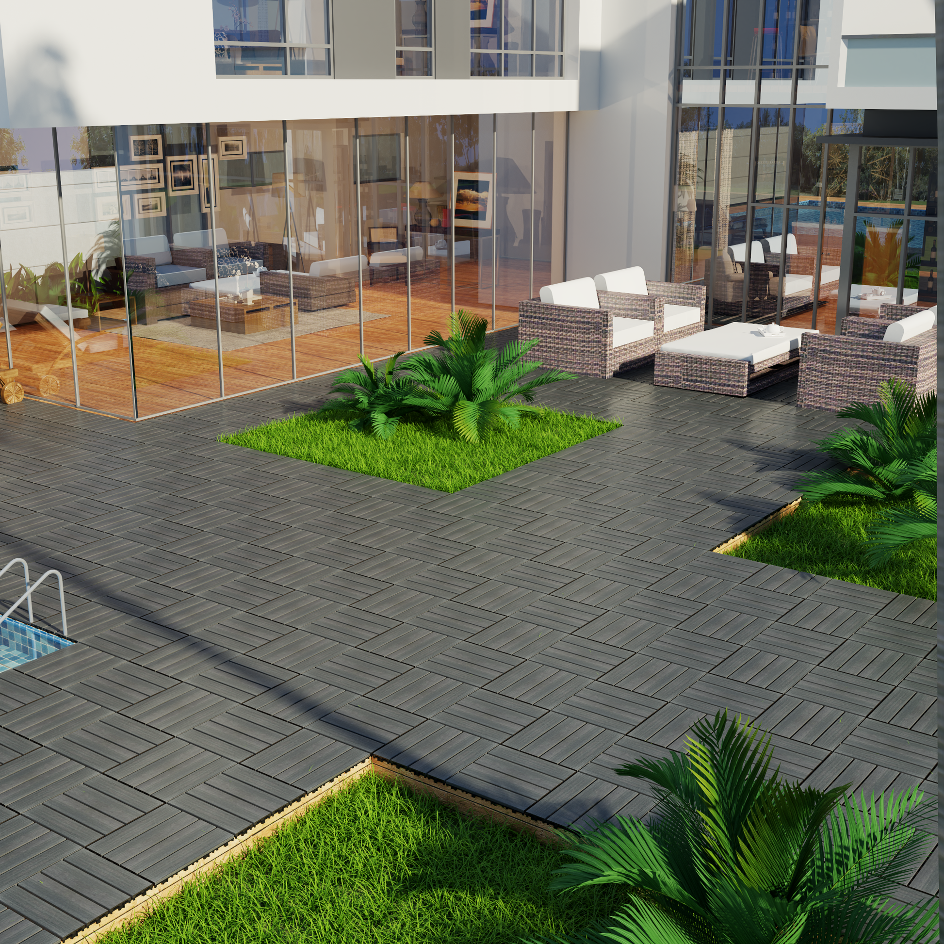 Dark grey interlocking deck tiles arranged in a herringbone pattern on a patio