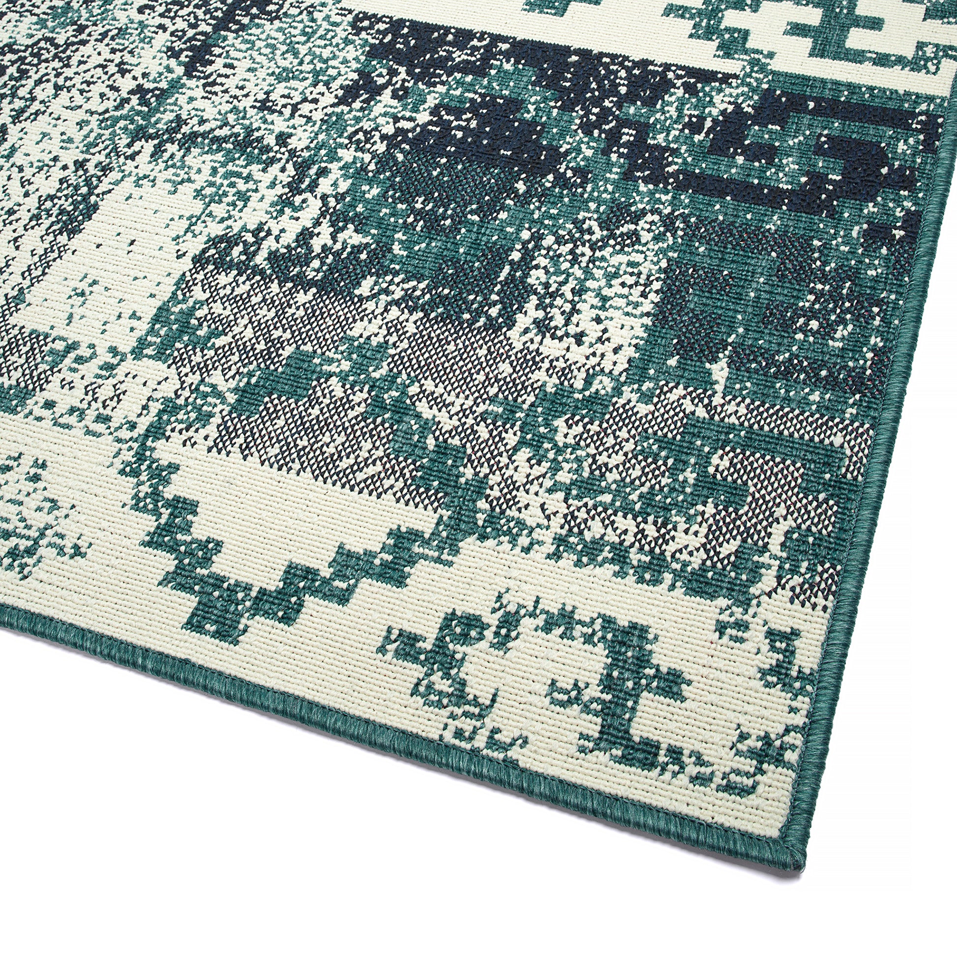 Modern geometric area rug with abstract teal and cream pattern