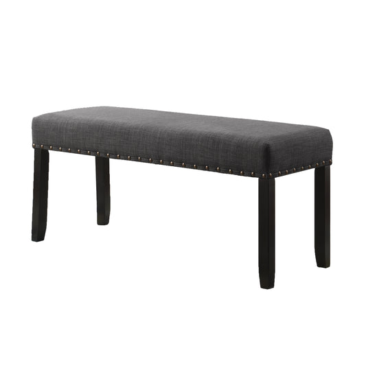Dark gray upholstered bench with nailhead trim and dark wooden legs