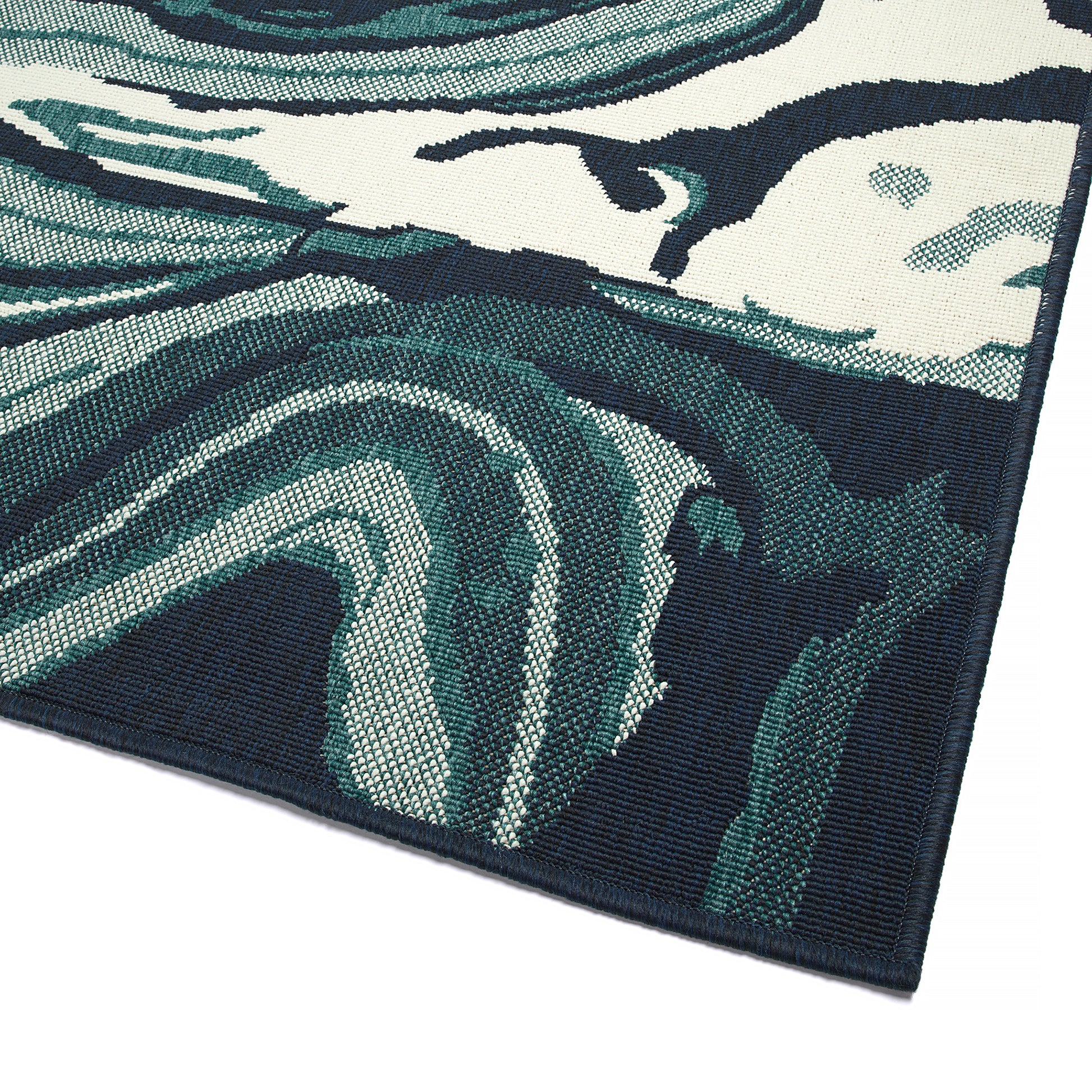 Abstract navy blue and teal wave pattern indoor area rug